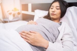 Pregnancy Insomnia: Causes & Treatment