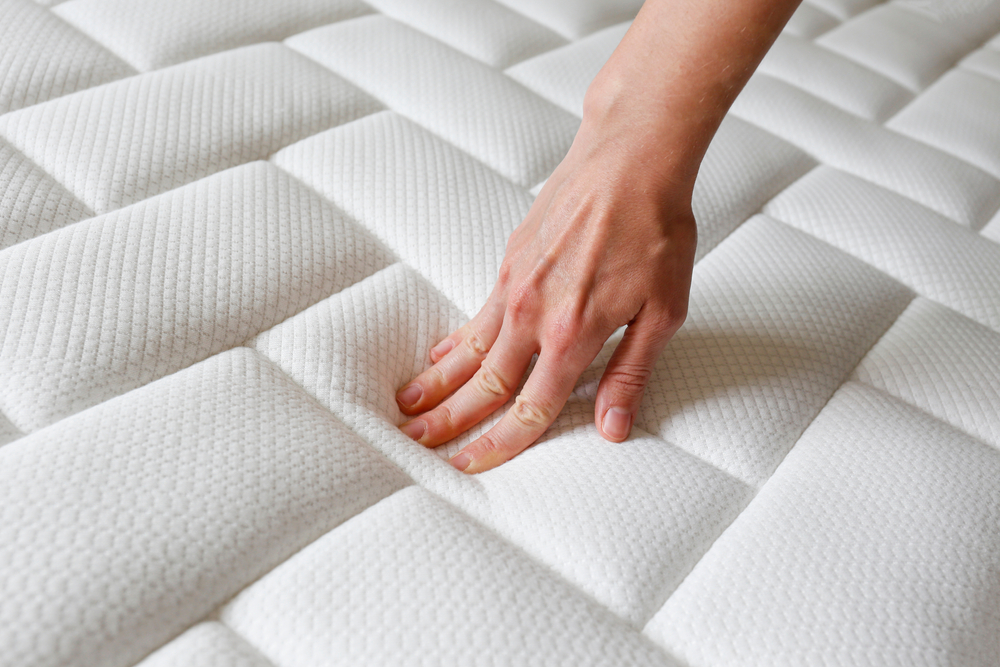 does a foundation make a mattress firmer