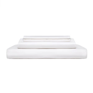 Stack of folded white sheets isolated with a white background